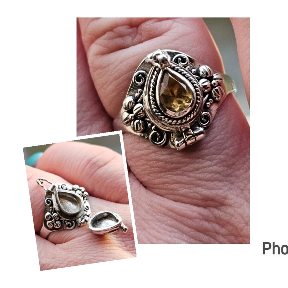 New. Citrine locket ring sterling silver 8 3/4. Stamped 925. Metal work is so be